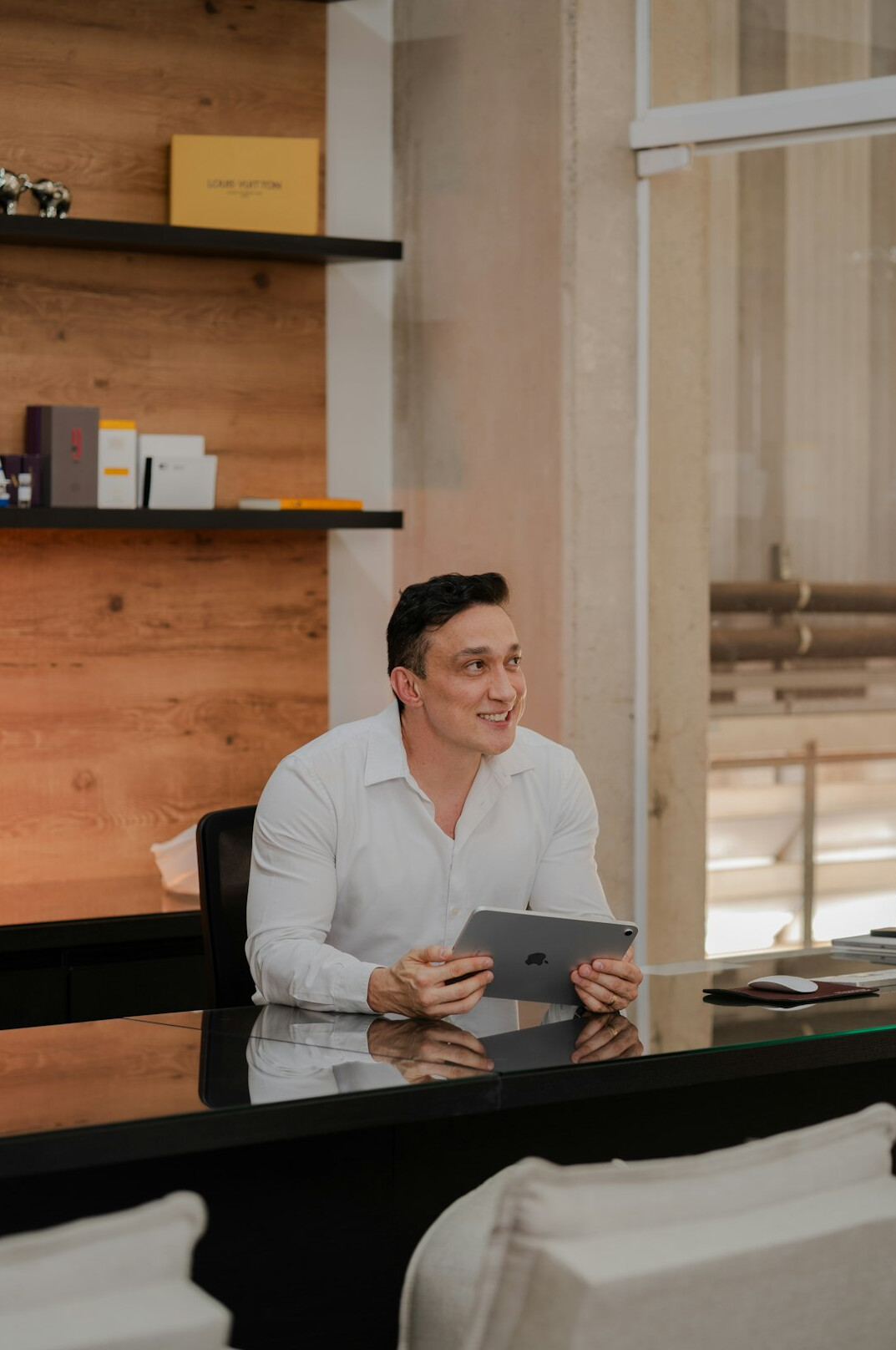 confident professional at desk